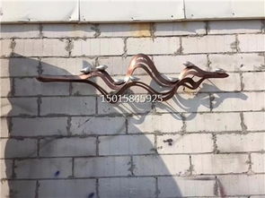 匠心雕琢 售樓部戶外不銹鋼藝術(shù)背景墻，激光圍邊與手工鍛造的藝術(shù)對話